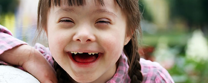 A girl with Down syndrome having fun